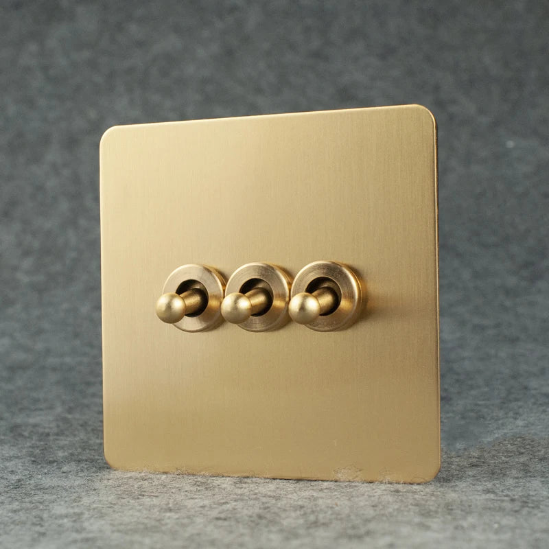 SXS12 Brushed Brass Sockets and Toggle Switches