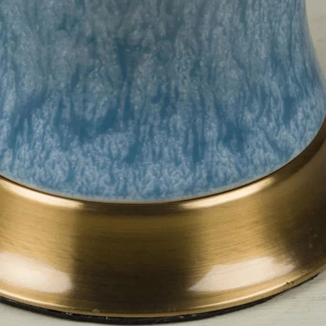 Lampe de table en céramique bleu avec abat-jour en tissu crème ERA